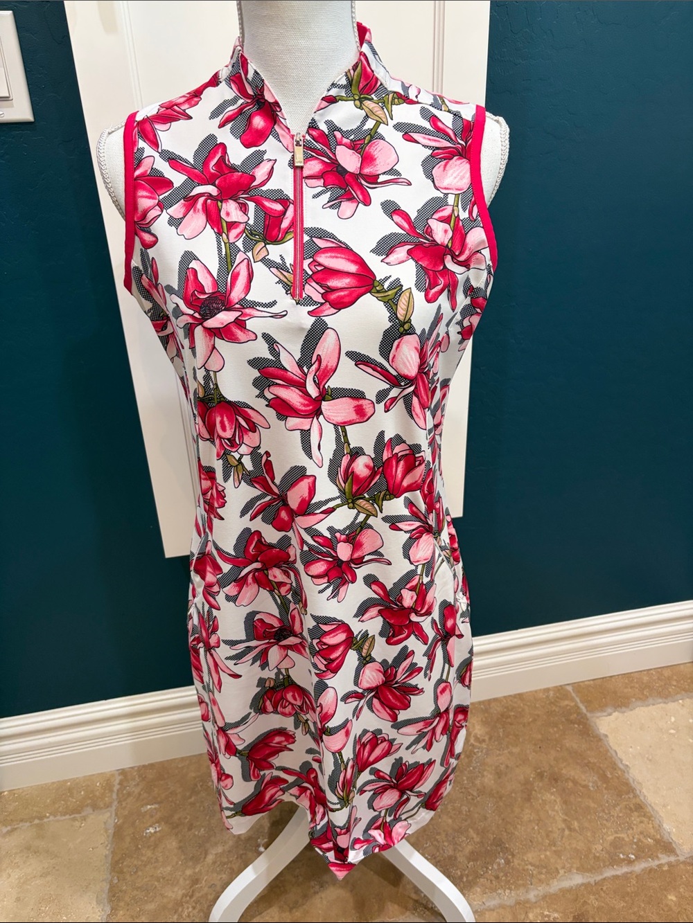 Tail sleeveless pink, red and white floral golf dress